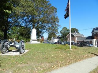 Cannon, Flag, and Monument on the Green